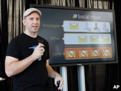 FILE - Andrew Bosworth, then a Facebook engineer, talks about the new Facebook messaging service in San Francisco, Nov. 15, 2010.