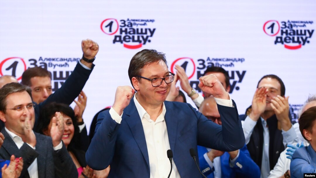 Serbian President Aleksandar Vucic gestures at Serbian Progressive Party (SNS) headquarters during a national election, the first in Europe since the outbreak of the coronavirus pandemic, in Belgrade, Serbia, June 21, 2020. 