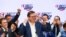 Serbian President Aleksandar Vucic gestures at Serbian Progressive Party (SNS) headquarters during a national election, the first in Europe since the outbreak of the coronavirus pandemic, in Belgrade, Serbia, June 21, 2020. 