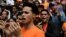 Opposition supporters shout during a gathering in front of the United Nations offices in Caracas, Venezuela, March 12, 2018. 