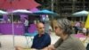Flavio Nervegna, left, at Tous a Table restaurant, Paris, Aug. 2013. (VOA L. Bryant)