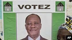 Poster of Ivory Coast opposition leader Alassane Ouattara, 25 Nov 2010
