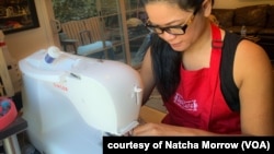 Natcha Morrow, once a Thai co-owner of sightseeing tour company in Los Angeles, sews fabric masks for sale as her alternative source of income during COVID-19 pandemic