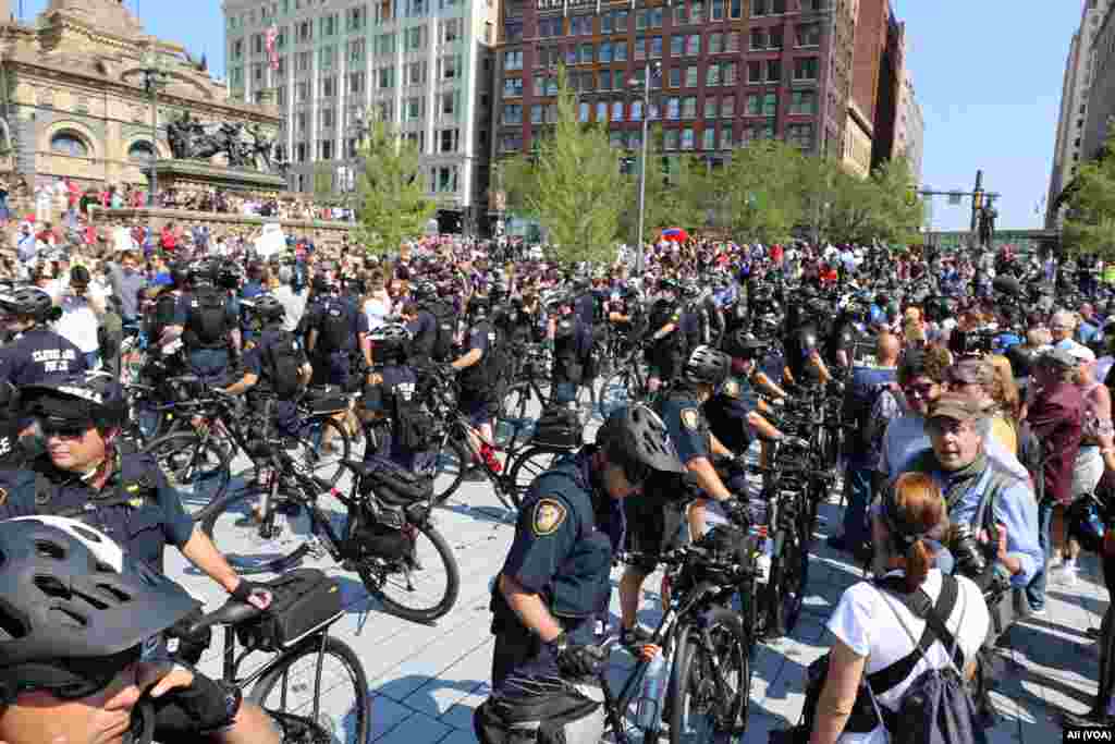 Police attempt to separate hundreds of protesters who had gathered in Public Square in downtown Cleveland, July 19, 2016.