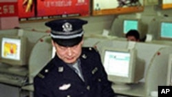 Chinese police checks internet bar