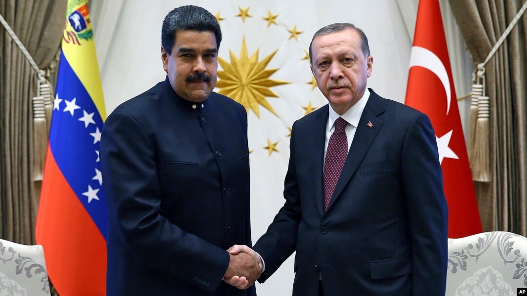 Turkey's President Recep Tayyip Erdogan, right, shakes hands with Venezuela's President Nicolas Maduro, left, prior to their meeting at the Presidential Palace in Ankara, Turkey, Oct. 6, 2017. 