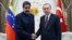 Turkey's President Recep Tayyip Erdogan, right, shakes hands with Venezuela's President Nicolas Maduro, left, prior to their meeting at the Presidential Palace in Ankara, Turkey, Oct. 6, 2017. 