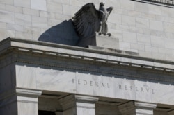 FILE - Federal Reserve Board building on Constitution Avenue is pictured in Washington, March 19, 2019.