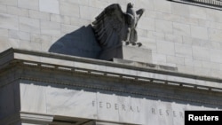 FILE - The Federal Reserve Board building on Constitution Avenue is pictured in Washington, March 19, 2019.