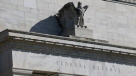 FILE - Federal Reserve Board building on Constitution Avenue is pictured in Washington, March 19, 2019.