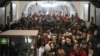 People take shelter in a metro station during an air raid alarm in Kyiv, Ukraine, Dec. 20, 2024.