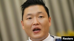 South Korean singer Psy speaks during an interview with Reuters before his concert in Seoul August 11, 2012.