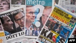 A photo taken on September 10, 2018 in Stockholm shows a selection of front pages of Swedish newspapers in Stockholm a day after the general elections.