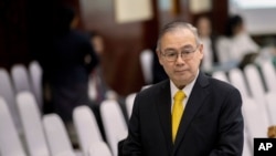 Philippines Foreign Affaires Secretary Teodoro Locsin Jr. walks ahead of the Special Meeting of Foreign ministers of The Association of Southeast Asian Nations (ASEAN) coordination council in Vientiane, Laos, Thursday, Feb. 20, 2020. (AP Photo…