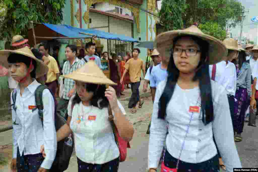 About 100 students joined Saturday's march, a day after a rally drew some 350 people.