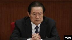 ທ່ານ Zhou Yongkang, ອະດີດສະມາຊິກຄະນະກົມການ ເມືອງສູນກາງພັກ ຄອມມິວນິສ ທີ່ຖືກລັດຖະບານສືບສວນ ໃນຂໍ້ຫາສໍ້ລາດບັງຫລວງ.