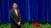 FILE - Japan's Prime Minister Shinzo Abe wait to meet China's President Xi Jinping, during their meeting at the Great Hall of the People, on the sidelines of the Asia Pacific Economic Cooperation (APEC) meetings, in Beijing, Nov. 10, 2014.