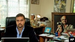Salim Amin, son of photojournalist Mohamed Amin (in photo)