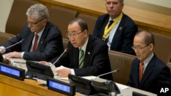 U.N. Secretary-General Ban Ki-moon, center, is joined by Intergovernmental Panel on Climate Change Chairman Hoesung Lee, right, and U.N. General Assembly President Mogens Lykketoft as he speaks during a high-level meeting on the Implementation of the Climate and Development Agendas, April 22, 2016, at U.N. headquarters.