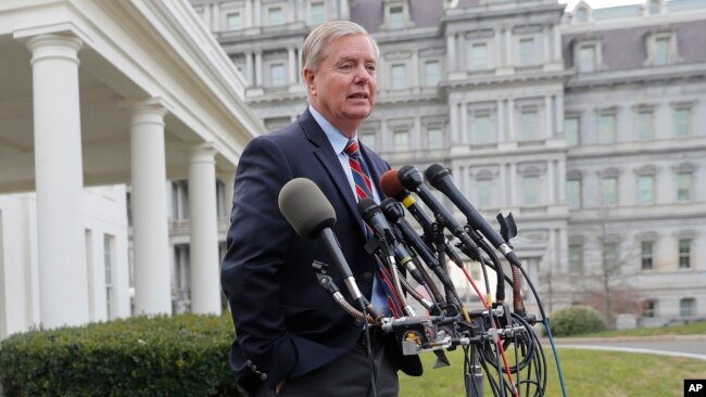 Republican Sen. Lindsey Graham speaks to members of the media outside the West Wing of the White House in Washington, after his meeting with President Donald Trump, Dec. 30, 2018.