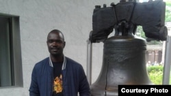 Stan Nyamanhindi at Liberty Bell, an iconic symbol of American Independence, in Philadelphia, Pennsylvania