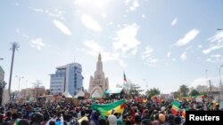 Supporters participate in a demonstration called by Mali transitional government after the Economic Community of West African States (ECOWAS) imposed sanctions in Bamako, Mali, Jan. 14, 2022.