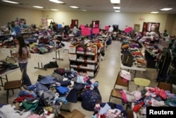 A general view shows the Sacred Heart Catholic Church temporary migrant shelter in McAllen, Texas, June 27, 2014.