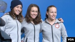 U.S. ski jumpers Jessica Jerome, Sarah Hendrickson and Lindsey Van speak to the media in Sochi, Feb. 10, 2014. (Parke Brewer/VOA)