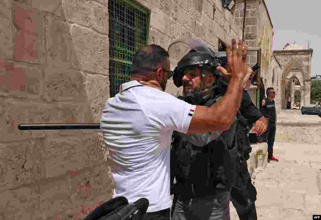 Israeli security forces and Palestinian Muslim worshippers clash in Jerusalem's al-Aqsa mosque compound, the third holiest site of Islam.