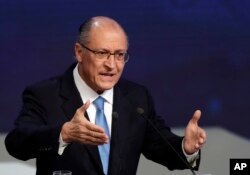 FILE - Geraldo Alckmin, former Sao Paulo's governor and Brazil's presidential candidate for the Social Democratic Party, speaks during a presidential debate in Sao Paulo, Brazil, Aug. 9, 2018.