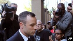 Oscar Pistorius, arrives at the high court in Pretoria, South Africa, April 15, 2014.