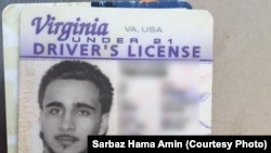 A driver's license of an American identified as Mohamed Jamal Khweis, accused of being a member of the Islamic State group, who has surrendered to Kurdish Peshmerga forces in northern Iraq.
