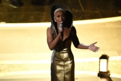 Cynthia Erivo performs "Stand Up" nominated for the award for best original song from "Harriet" at the Oscars on Sunday, Feb. 9, 2020, at the Dolby Theatre in Los Angeles. (AP Photo/Chris Pizzello)