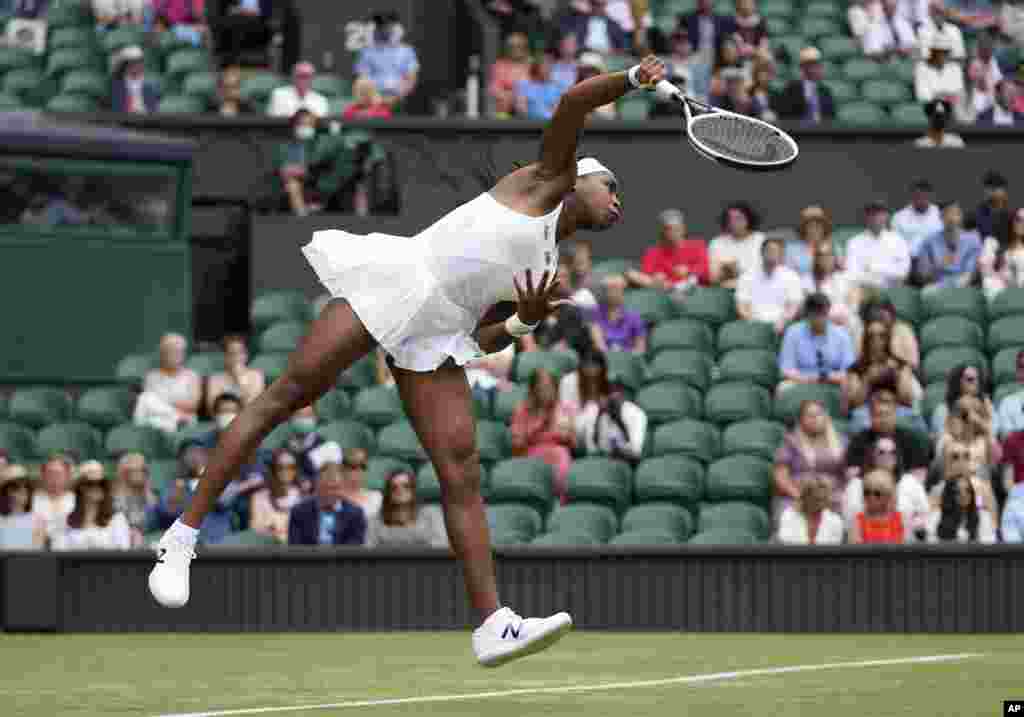 Coco Gauff of the U.S. serves to Russia&#39;s Elena Vesnina during the women&#39;s singles second round match on day four of the Wimbledon Tennis Championships in London.