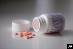 This Oct. 15, 2021 photo shows a bottle of aspirin in the Brooklyn borough of New York.