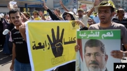 Supporters of Egypt's ousted Islamist president Mohamed Morsi take part in a rally in the coastal city of Alexandria in this September 20, 2013, file photo.