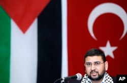 FILE - Sami Abu Zuhri, a spokesman for the Palestinian Hamas movement, talks during a press conference in Istanbul, Turkey, January 17, 2009.