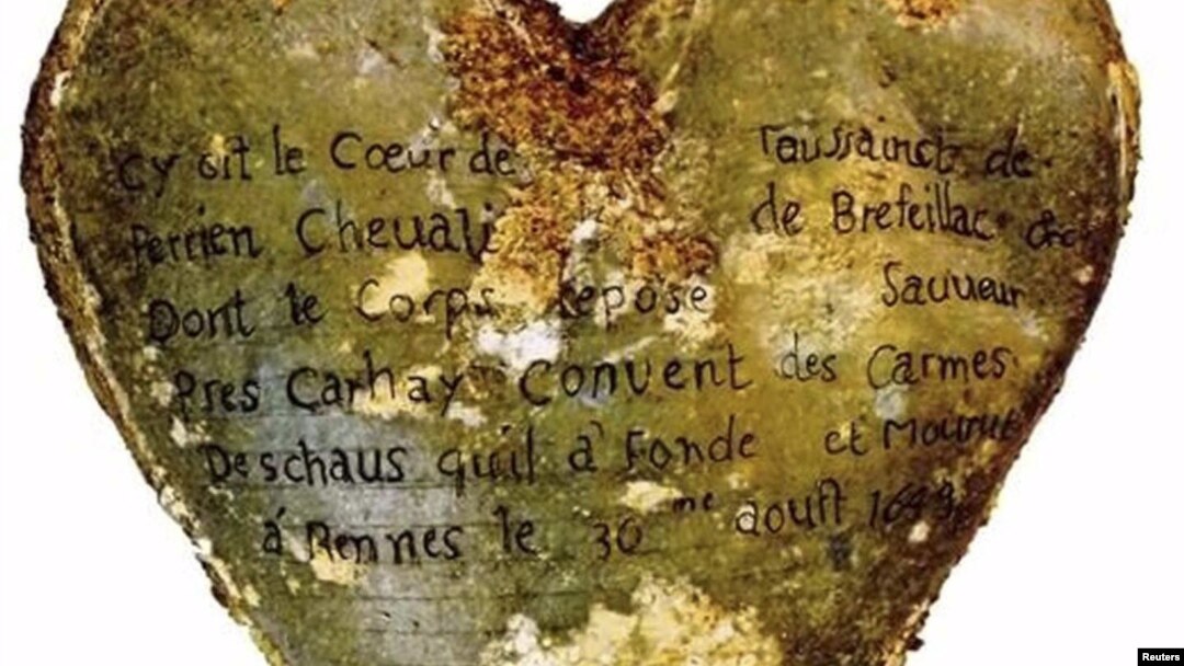 A heart-shaped lead urn with an inscription identifying the contents as the heart of Toussaint Perrien, Knight of Brefeillac, found during excavation of the ruins of the medieval Jacobins convent in Rennes.