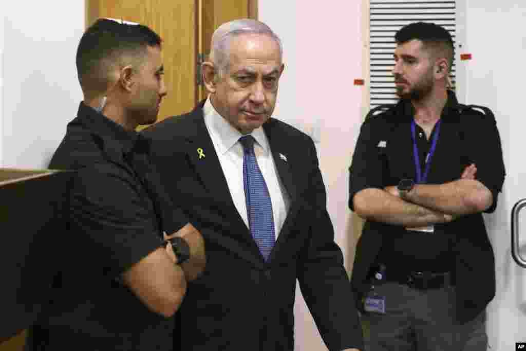 Israeli Prime Minister Benjamin Netanyahu attends his trial on corruption charges at the district court in Tel Aviv.