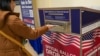 A voter casts their ballot during early voting, a day ahead of the Super Tuesday primary election, at the San Francisco City Hall voting center in San Francisco, California, March 4, 2024.