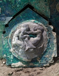 A detail of the decoration of a chariot that was found in Civita Giuliana, north of Pompeii. Officials at the Pompeii archaeological site near Naples announced its discovery Feb. 27, 2021.