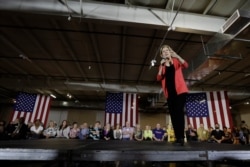 FILE - Democratic presidential candidate Sen. Elizabeth Warren, D-Mass., speaks at the RV/MH Hall of Fame and Museum, June 5, 2019, in Elkhart, Indiana.