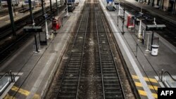 FILE - This file photo taken on June 01, 2016, deserted platforms are pictured at the Lyon Perrache railway station, during a strike of employees of French state-owned rail operator SNCF, protesting against government labor reforms.