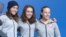 U.S. ski jumpers Jessica Jerome, Sarah Hendrickson and Lindsey Van speak to the media in Sochi, Feb. 10, 2014. (Parke Brewer/VOA)
