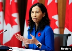 FILE - Canada's Chief Public Health Officer Dr. Theresa Tam speaks at a news conference held to discuss the country's coronavirus response in Ottawa, Ontario, Canada, Nov. 6, 2020.
