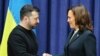 Ukrainian President Volodymyr Zelensky and US Vice President Kamala Harris shake hands at the end of a press conference at the Munich Security Conference (MSC) in Munich, southern Germany on February 17, 2024.