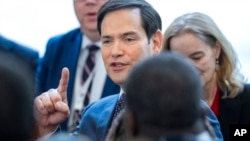 US Secretary of State Marco Rubio greets State Department staff during a welcome event at the State Department, Jan. 21, 2025, in Washington.