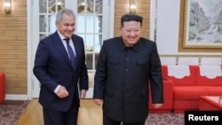 FILE - North Korean leader Kim Jong Un meets with Russian Security Council Secretary Sergei Shoigu in this photo from Korea's state news agency on Sept. 14, 2024. On Sept. 19, the U.S. targeted five banks and one person for helping the two nations dodge financial sanctions.