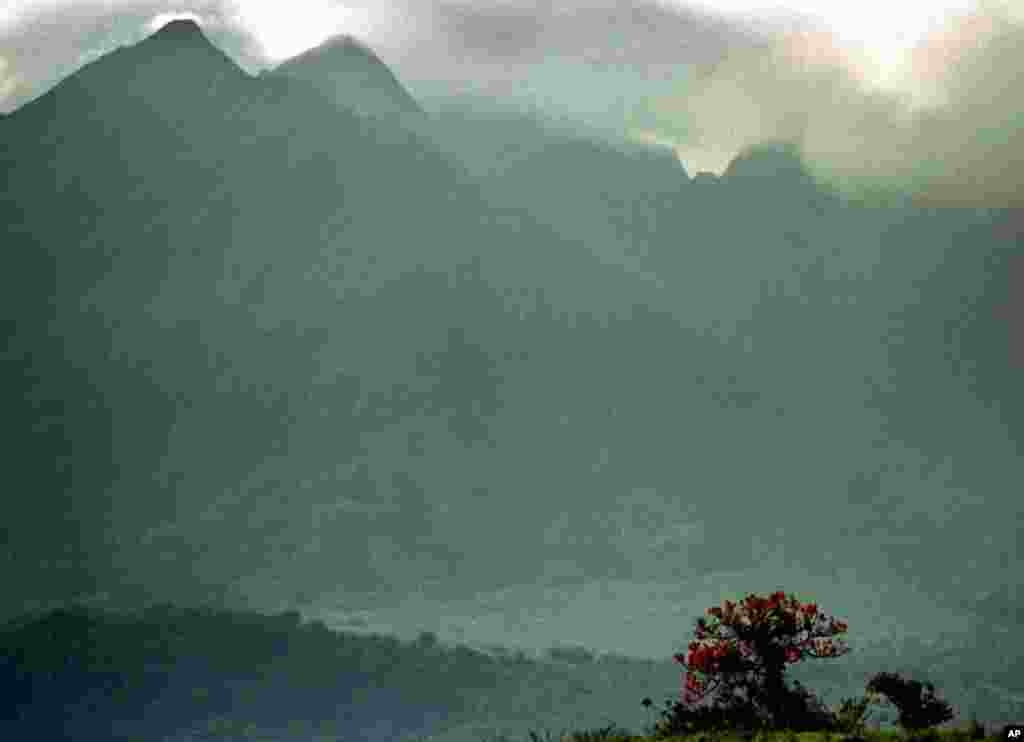 An afternoon shower rolls over Africa&#39;s oldest wildlife reserve, Virunga National Park. Two decades of Central African politics and armed militias taken the lives of thousands of civilians, elephants and hippos, and more than 150 of the park&#39;s game wardens. &nbsp;