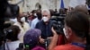 FILE - Cuban President Miguel Diaz-Canel talks to the media, in San Antonio de los Banos, Cuba, July 11, 2021.